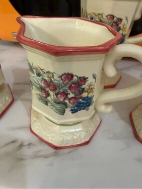Avon Cream and Red Trim Ceramic creamerwith Berry Floral Motif